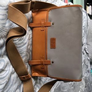Cole Haan reflective messenger bag.